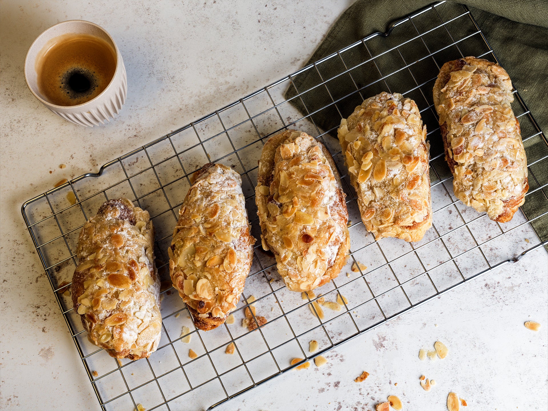 A tray of wholesale almond croissants