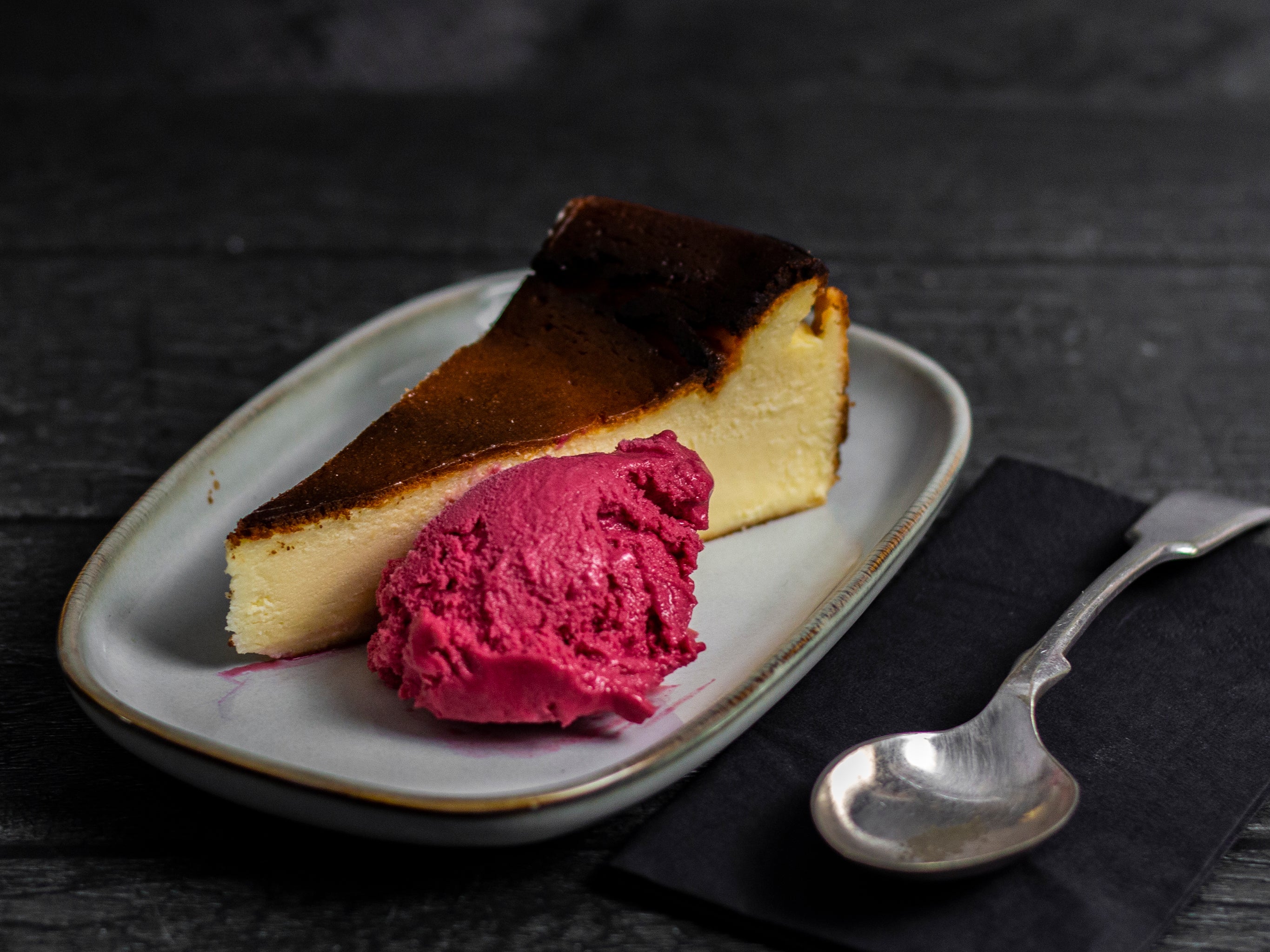 Serve our wholesale burnt basque cheesecake with a scoop of sorbet