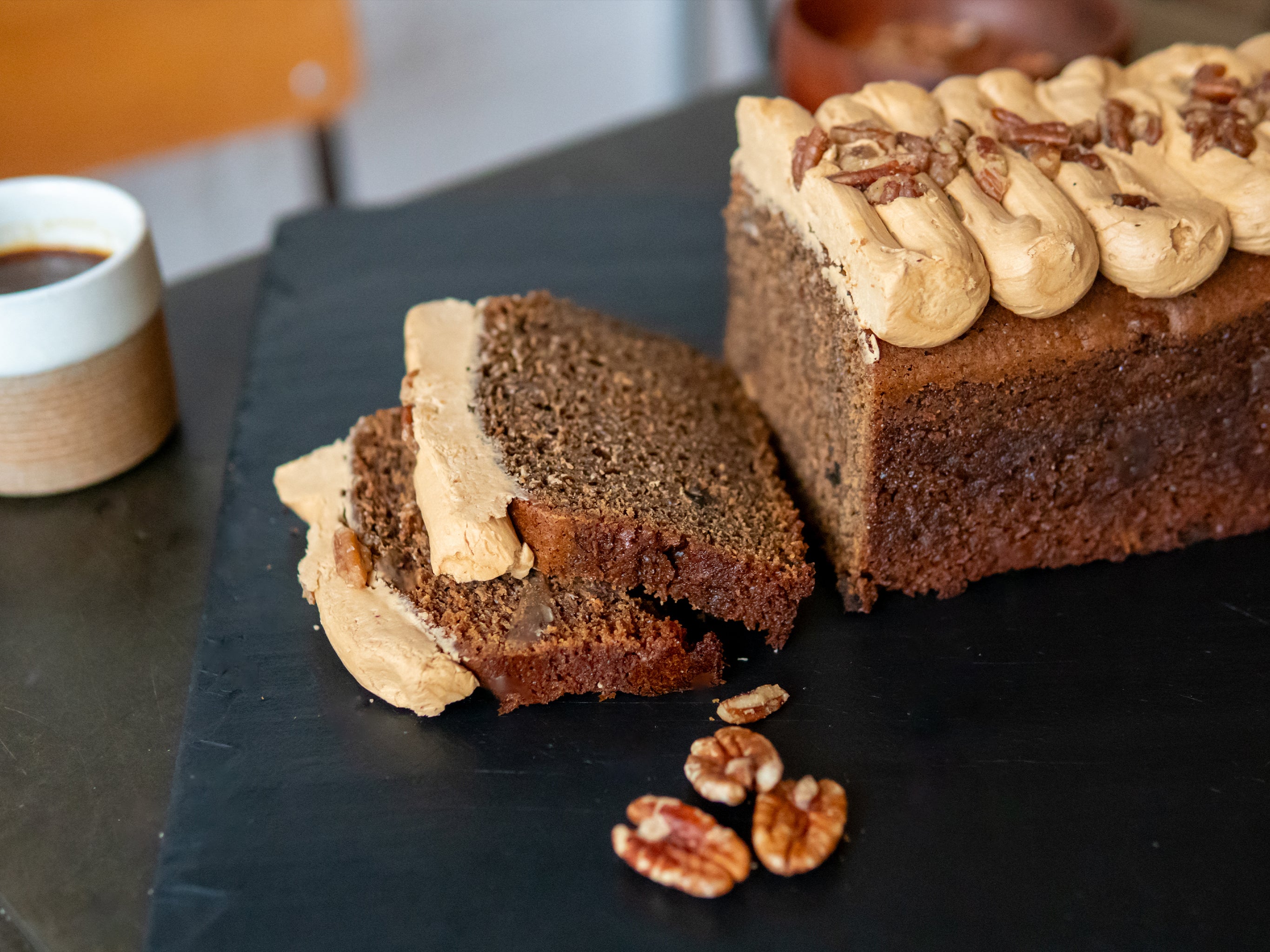 Slices of our wholesale Coffee & Pecan Loaf from Cakesmiths