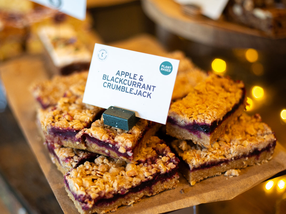 Green Terrazzo product display card stands used for our Apple & Blackcurrant Crumblejack