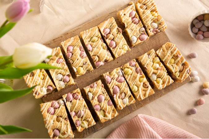 A cookie bar topped with mini eggs
