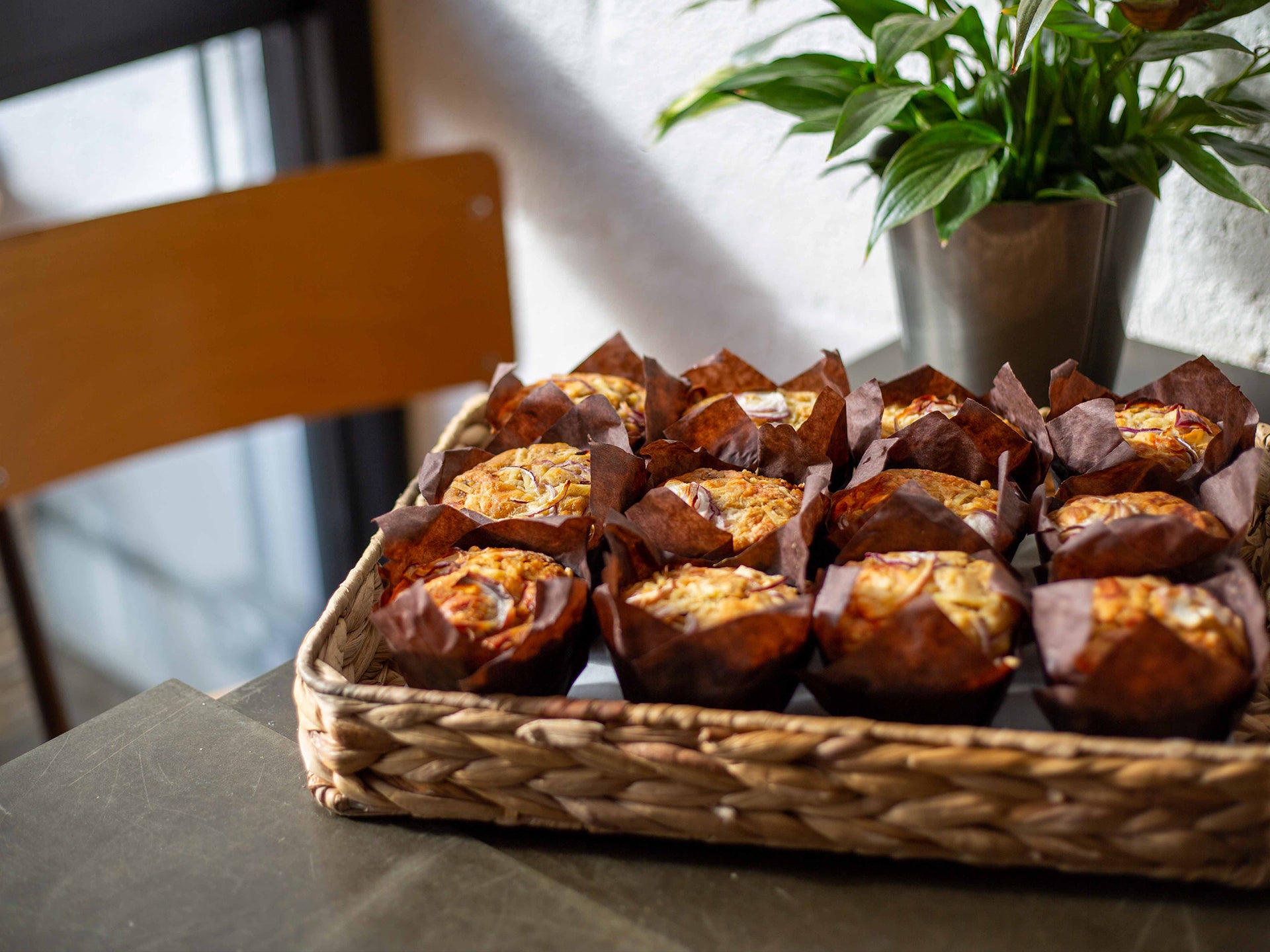A tray of whole savoury muffins from Cakesmiths