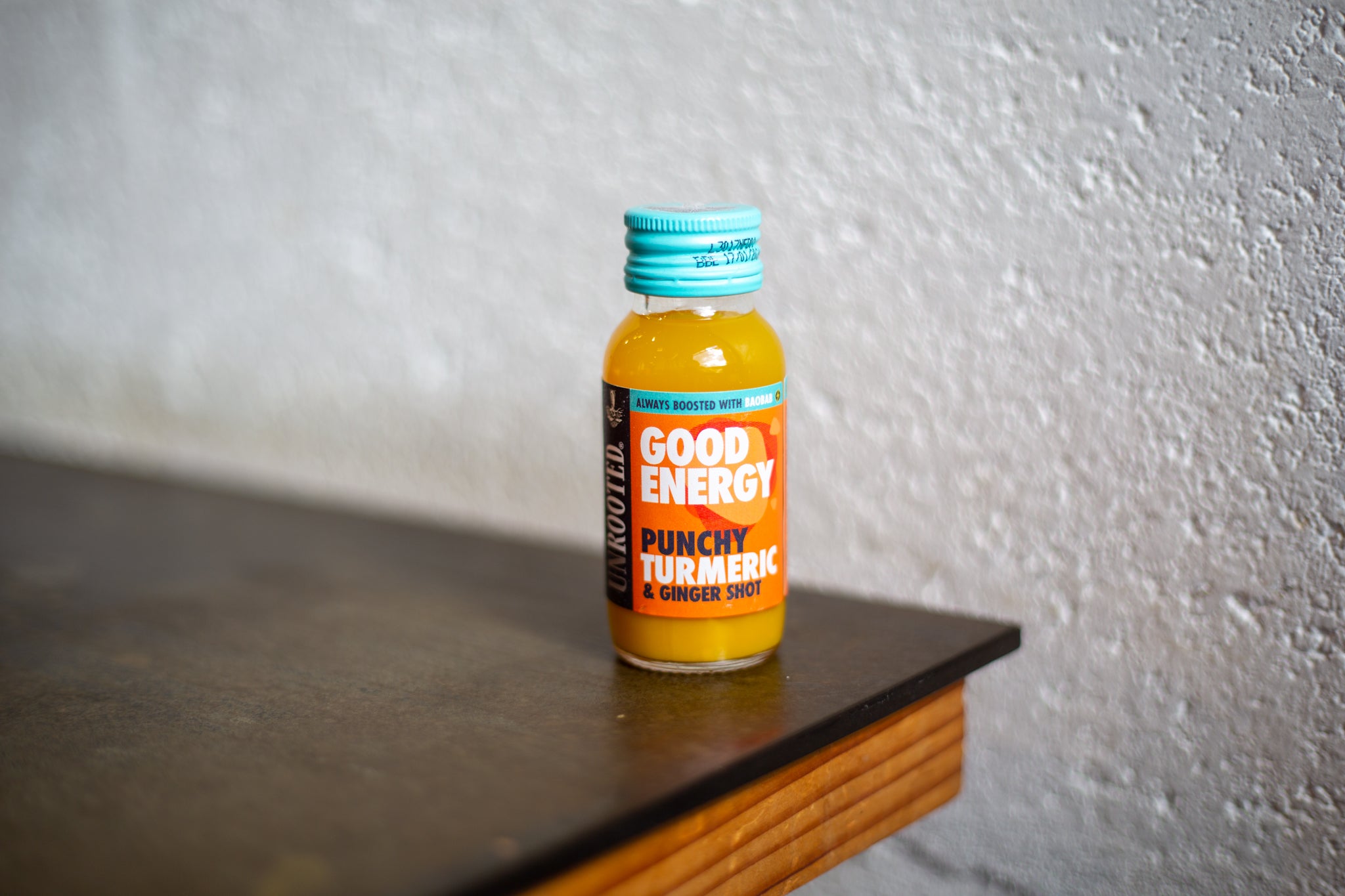 Punchy Turmeric & Ginger shots from Unrooted, available from Cakesmiths