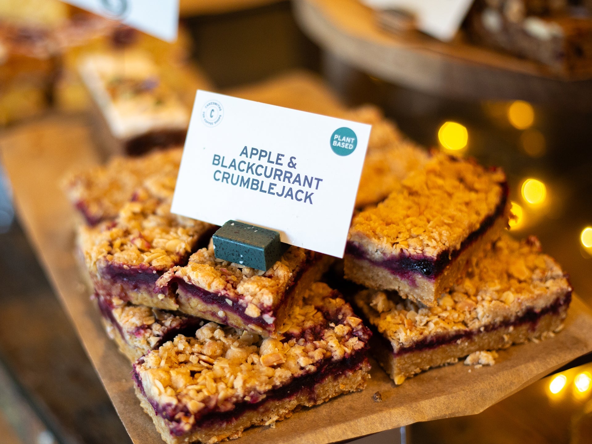 Green Terrazzo product display card stands used for our Apple & Blackcurrant Crumblejack
