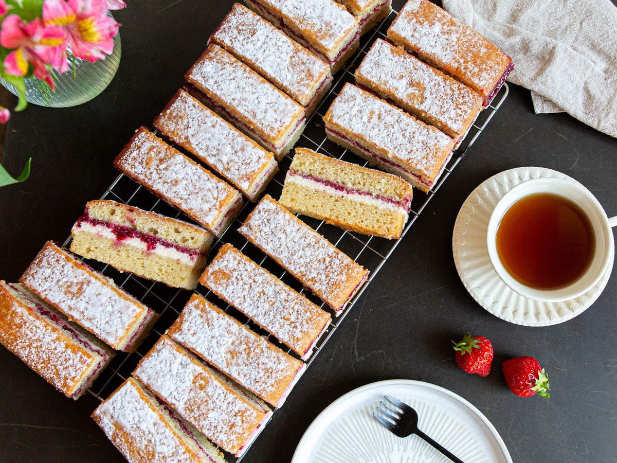 A tray of wholesale victoria sponge cake, best served with tea