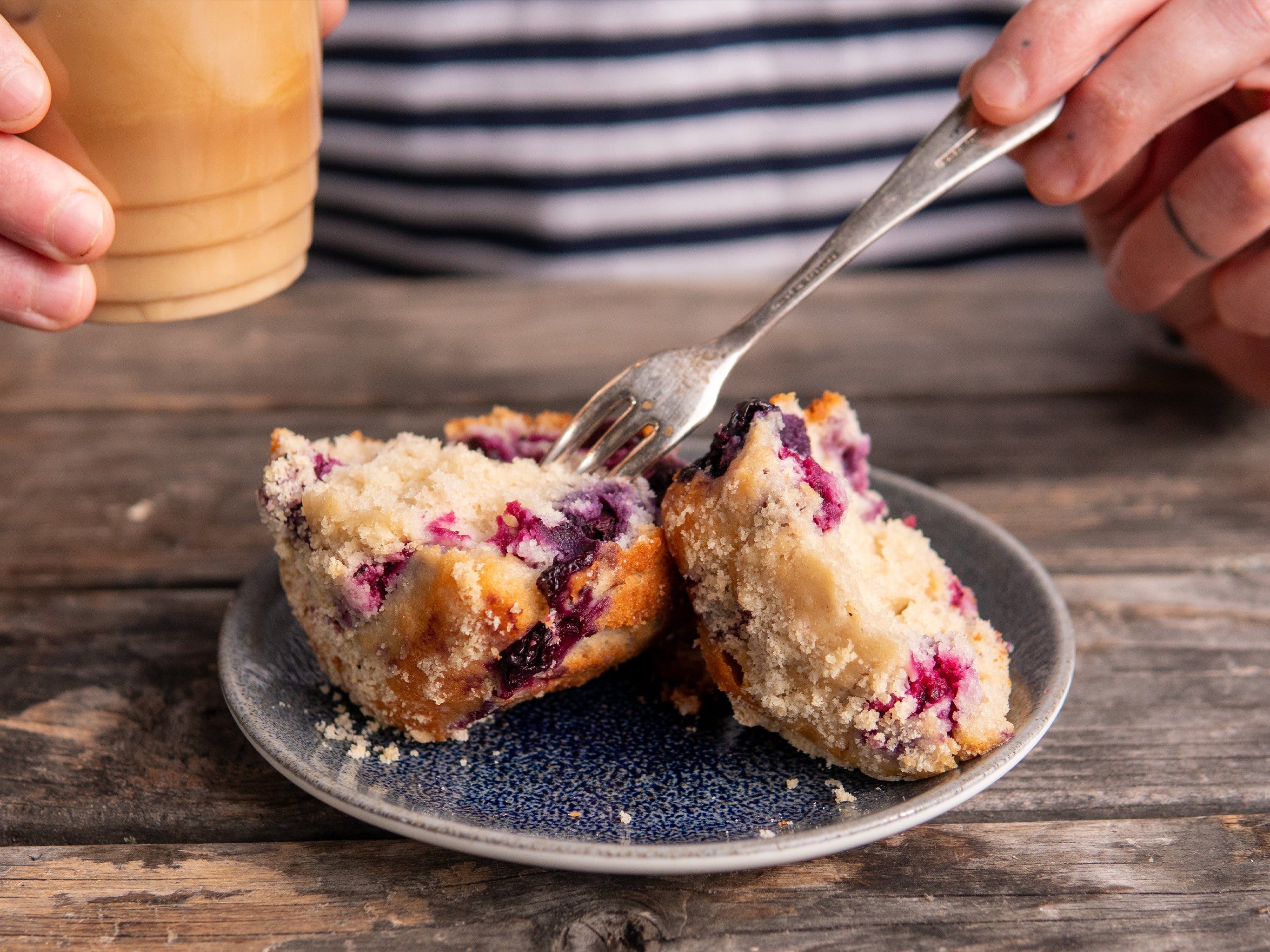 Tucking into a wholesale Blueberry Muffin | Cakesmiths