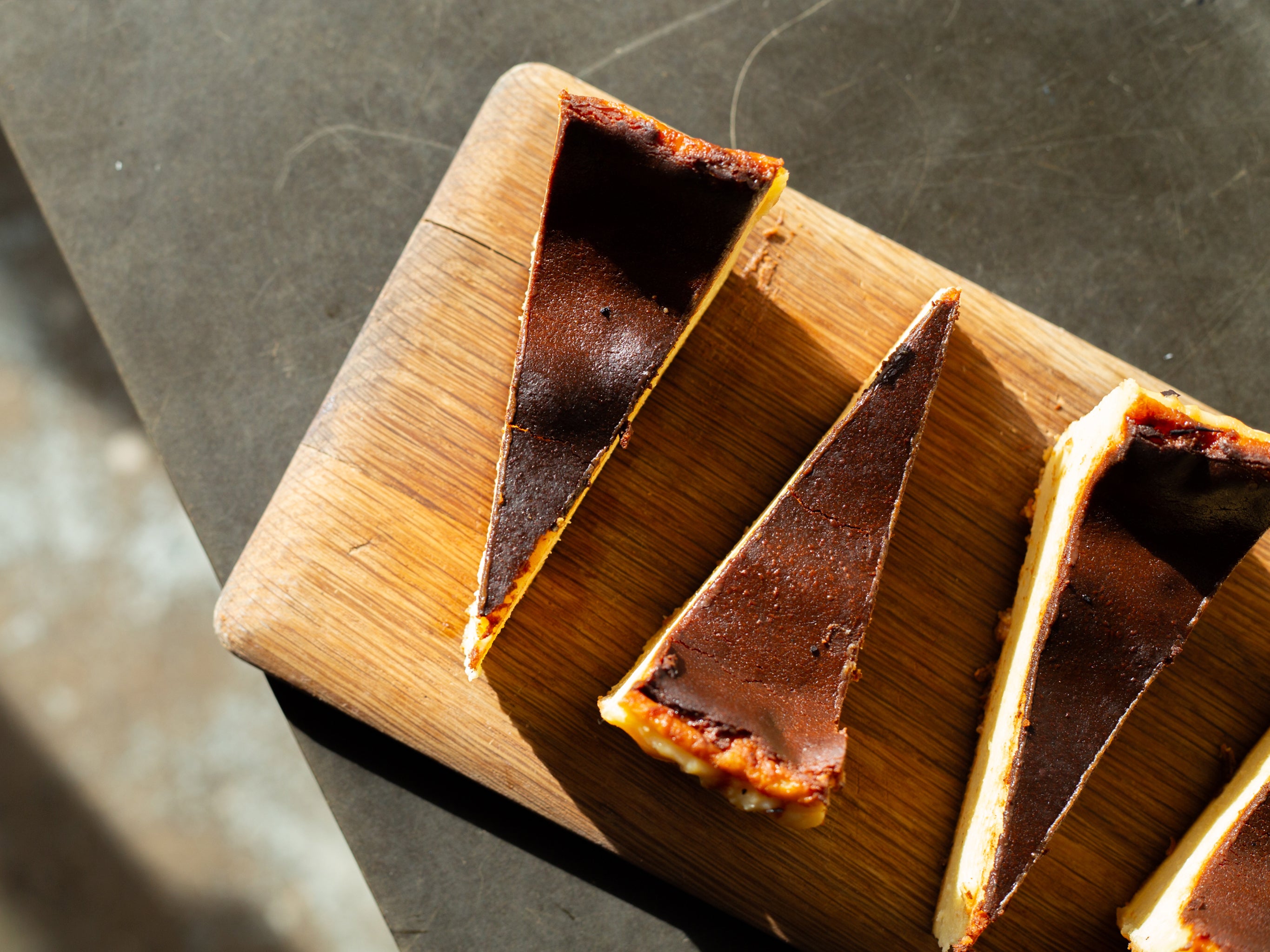 A tray of our wholesale burnt basque cheesecake
