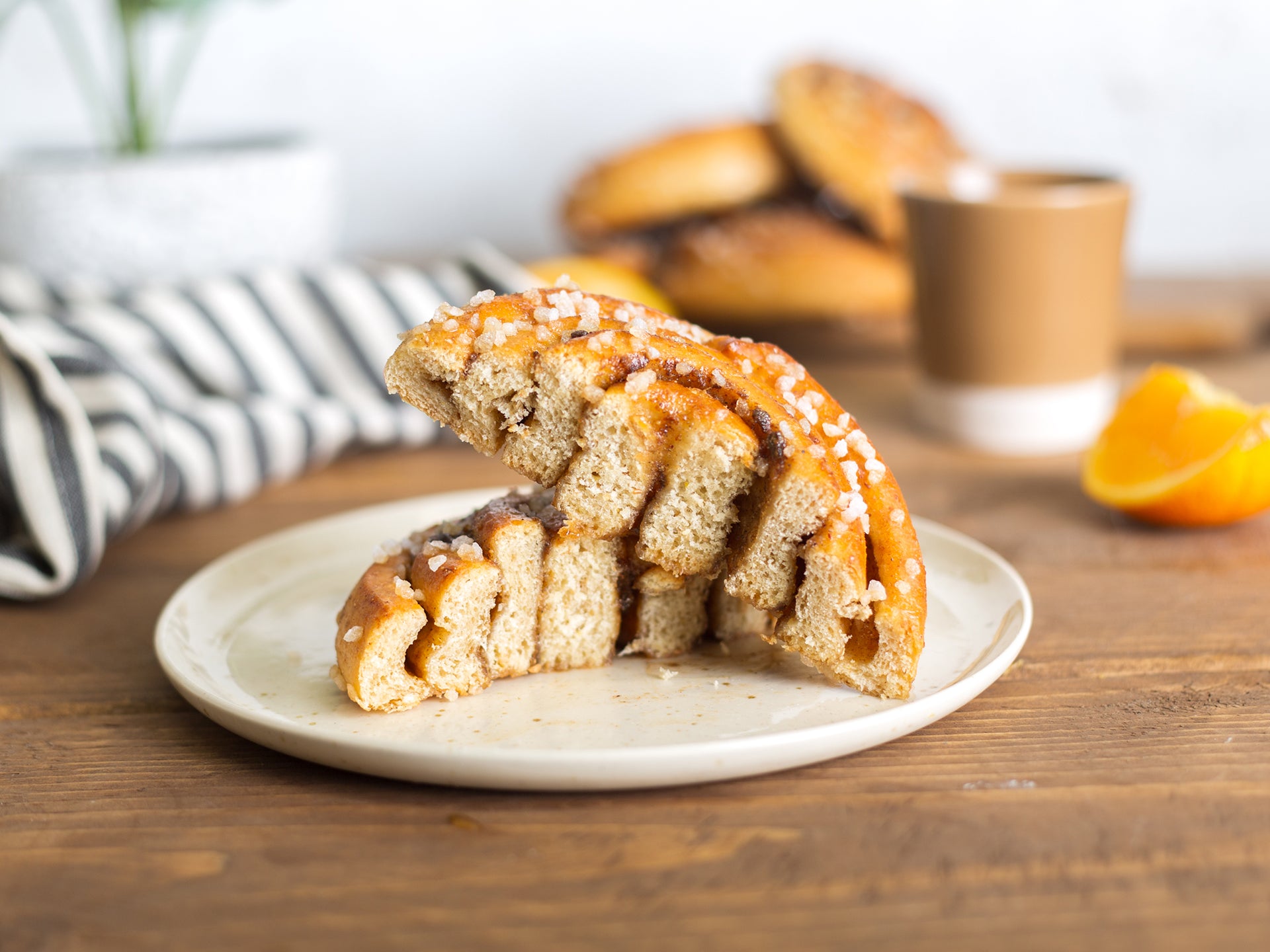 A cross-section of cardamom & orange buns from Cakesmiths