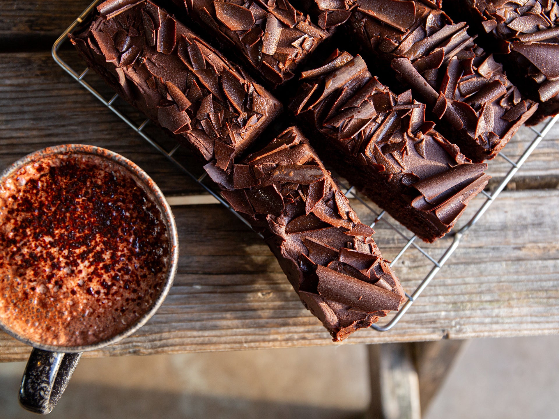 A tray of pre-sliced wholesale chocolate cake