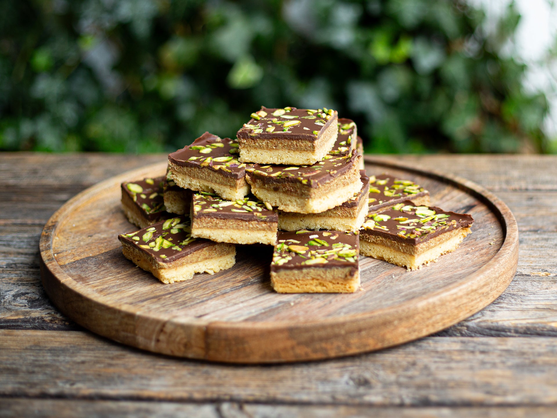 A stack of chocolate & pistachio shortbread