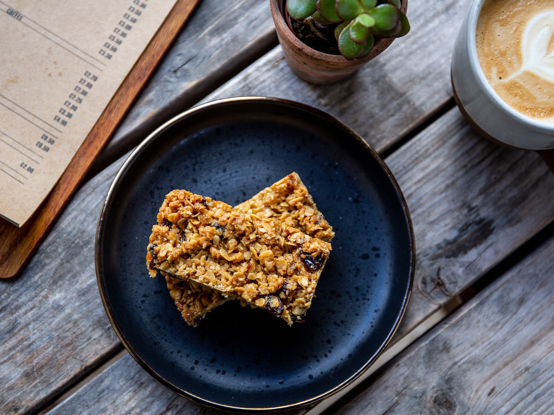 Slices of Wholesale Dark & Fruity Flapjack from Cakesmiths