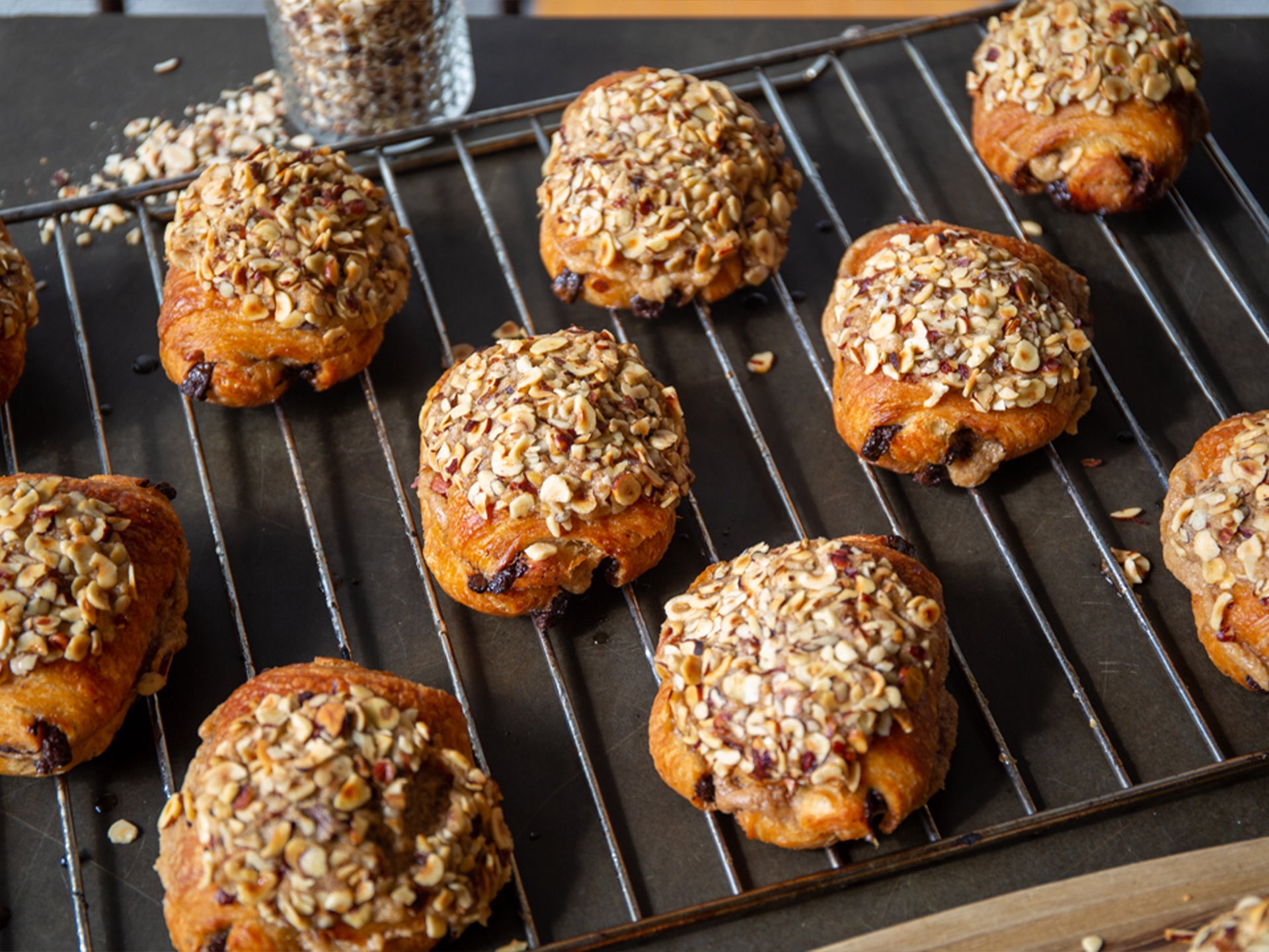 A tray of hazelnut topped wholesale hazelnut pain au chocolats