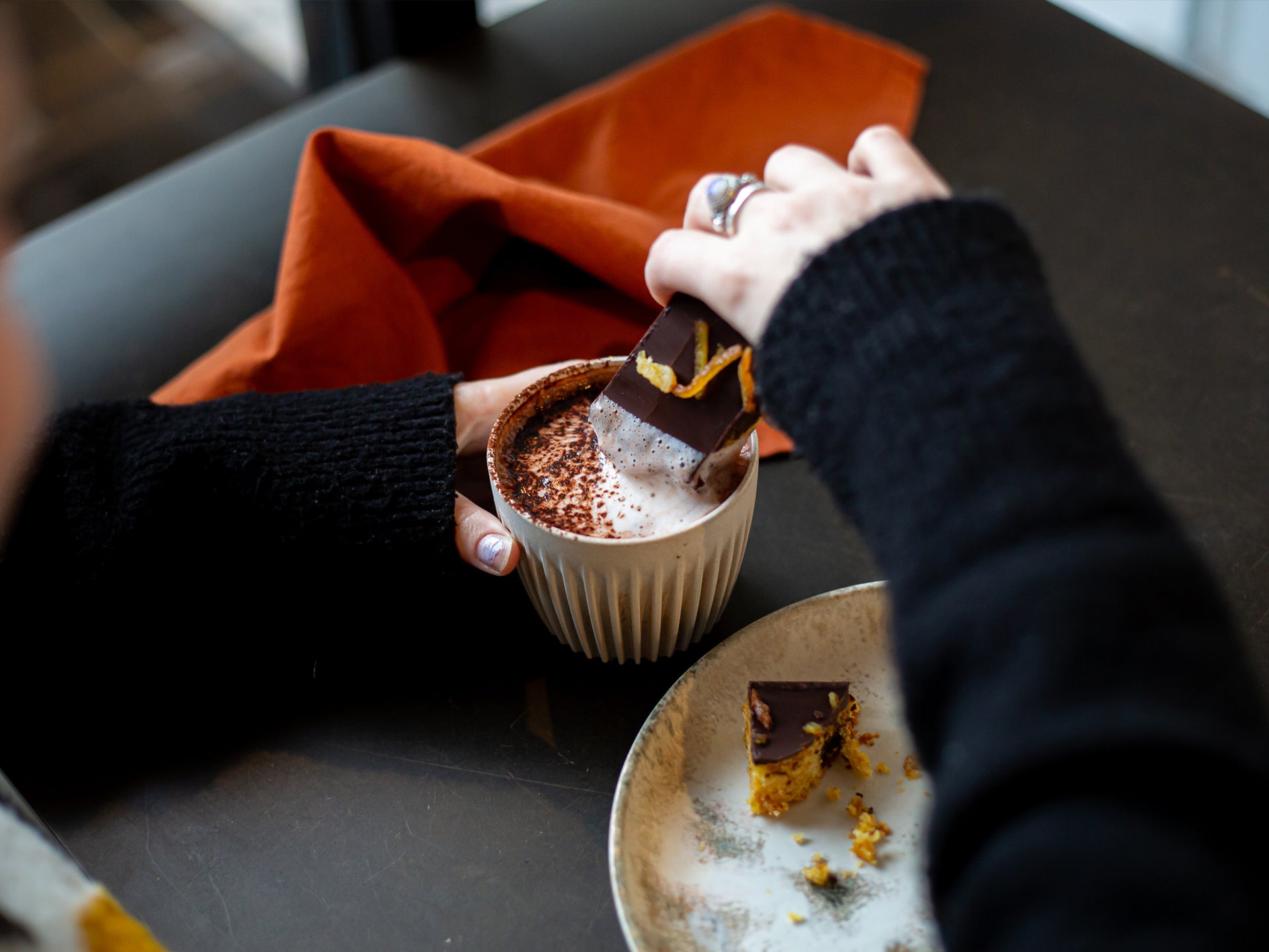 Dip our jaffa cake traybake in hot chocolate