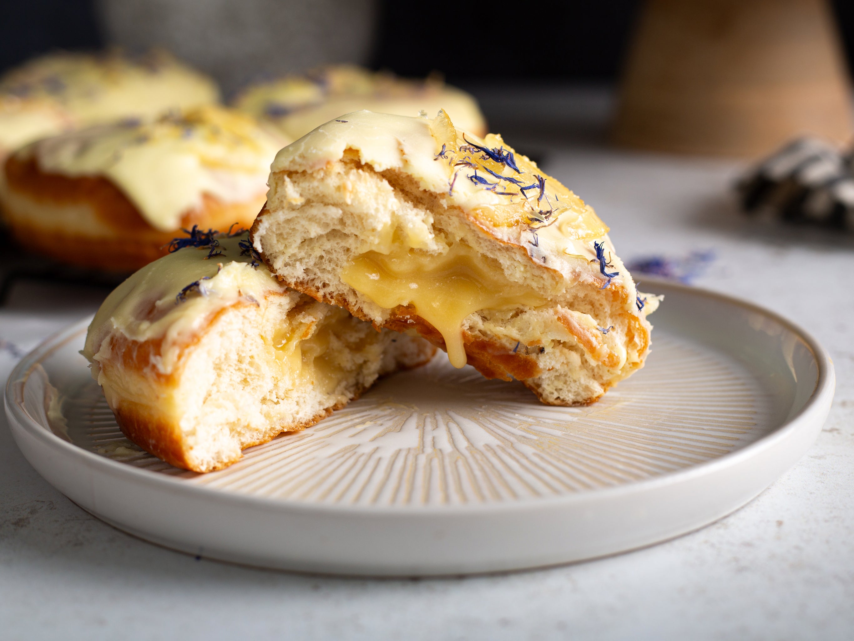 Tuck into one of our wholesale lemon dougnnuts, with an oozy lemon curd filling