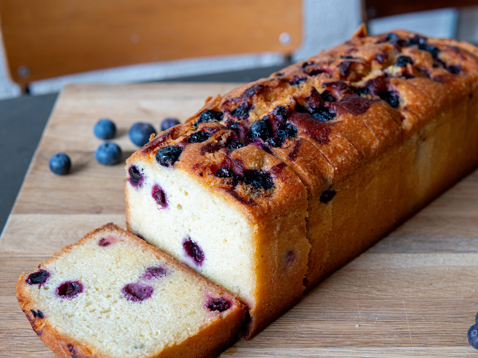 A pre sliced loaf of wholesale lemon & blueberry cake