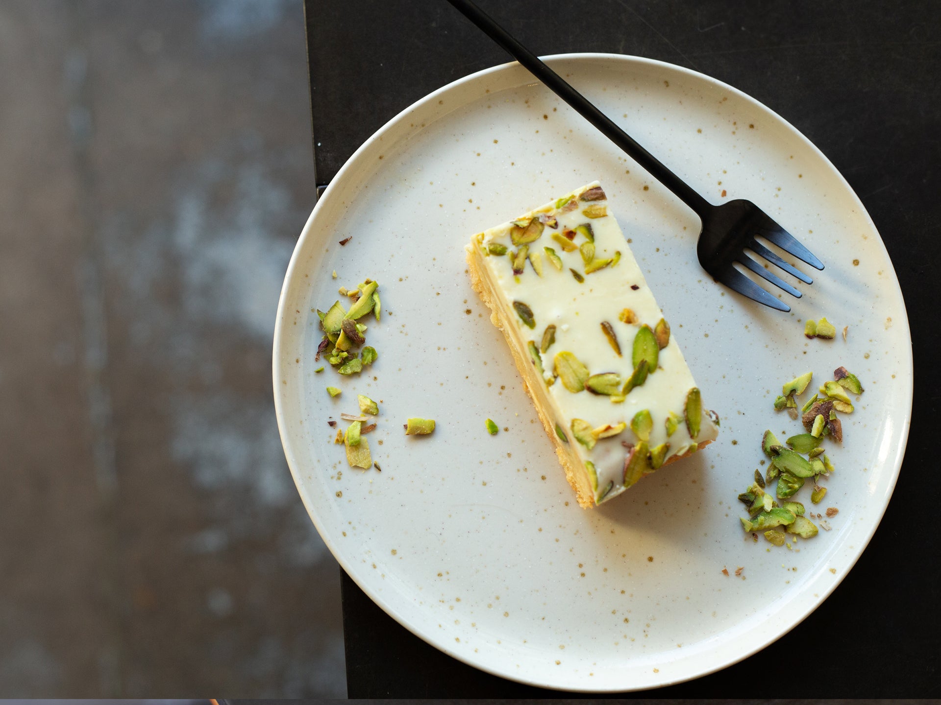 A slice of wholesale lemon & pistachio blondie