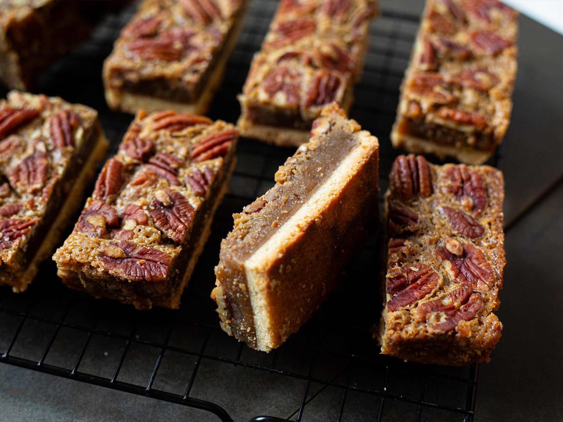 Wholesale maple pecan pie bars on a cooling rack
