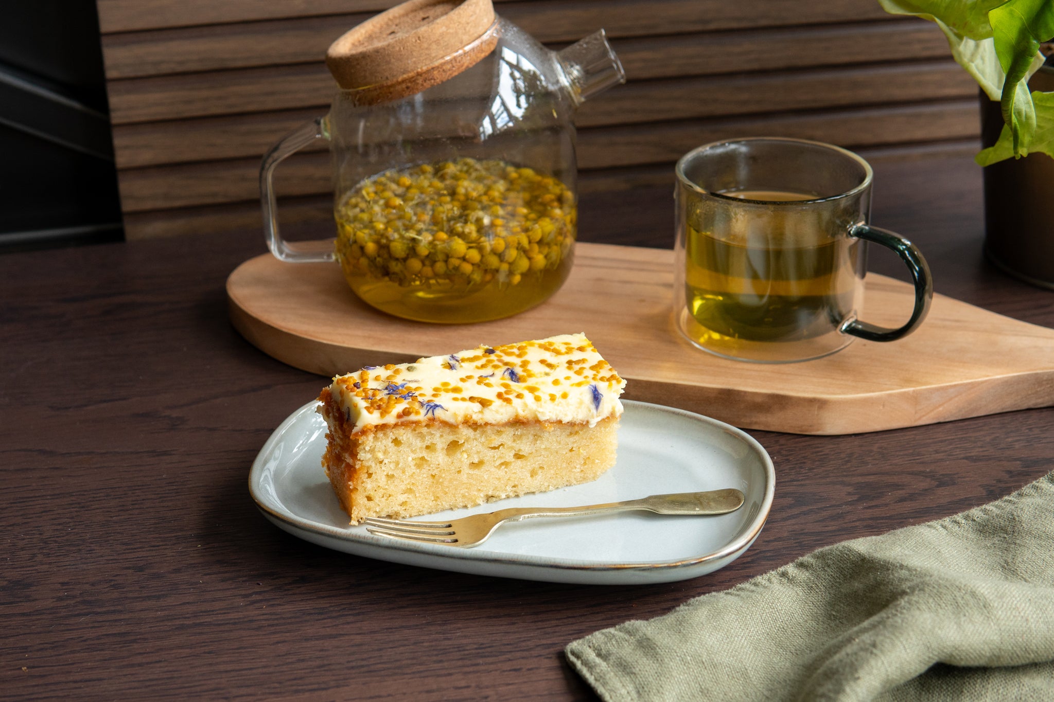 Serve a cup of Nuditea Loose Leaf tea with a slice of Cakesmiths cake