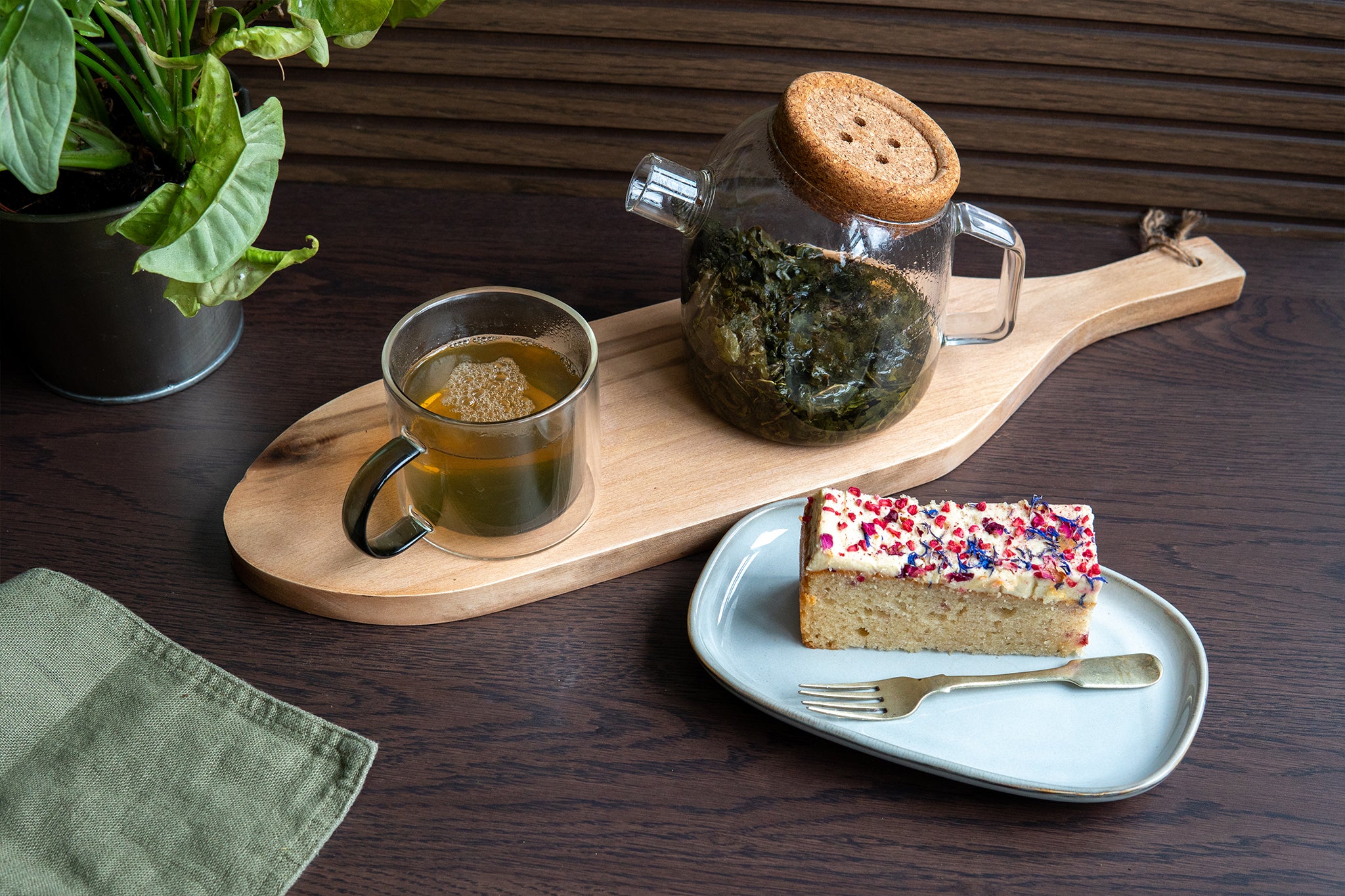 Serve a cup of Nuditea Milk Oolong Tea alongside a slice of Cakesmiths traycake