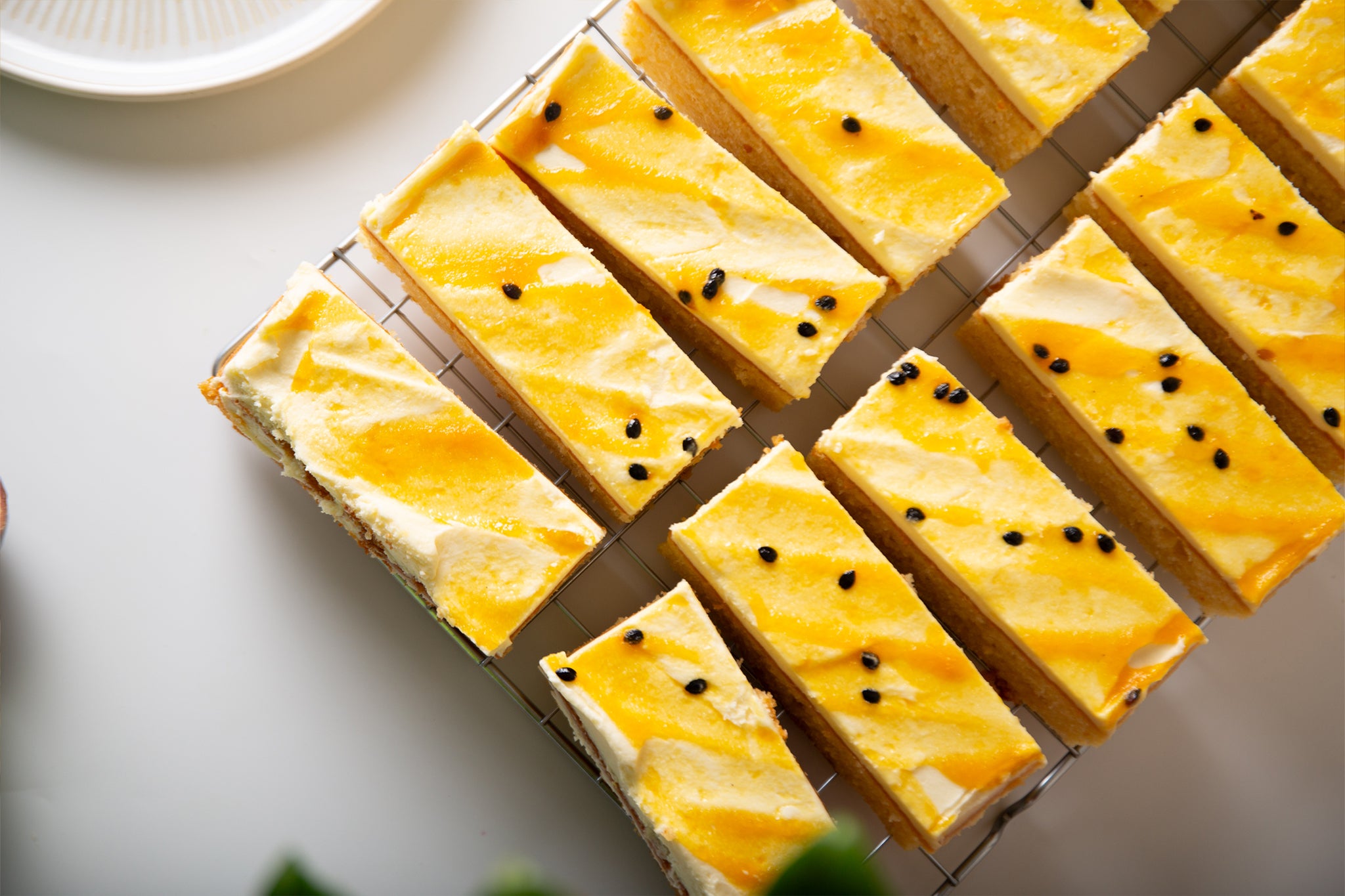 A close up of our wholesale passionfruit ripple traycake