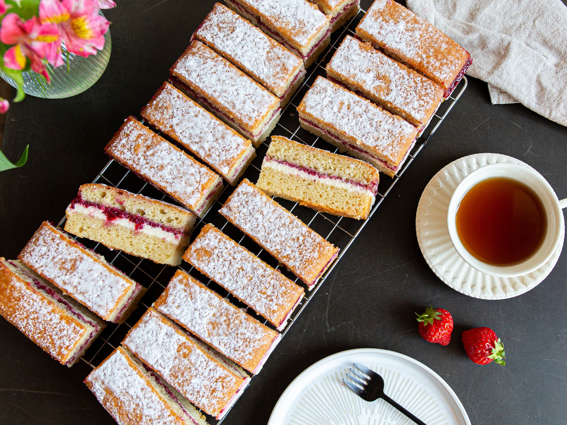 A tray of wholesale victoria sponge cake, best served with tea