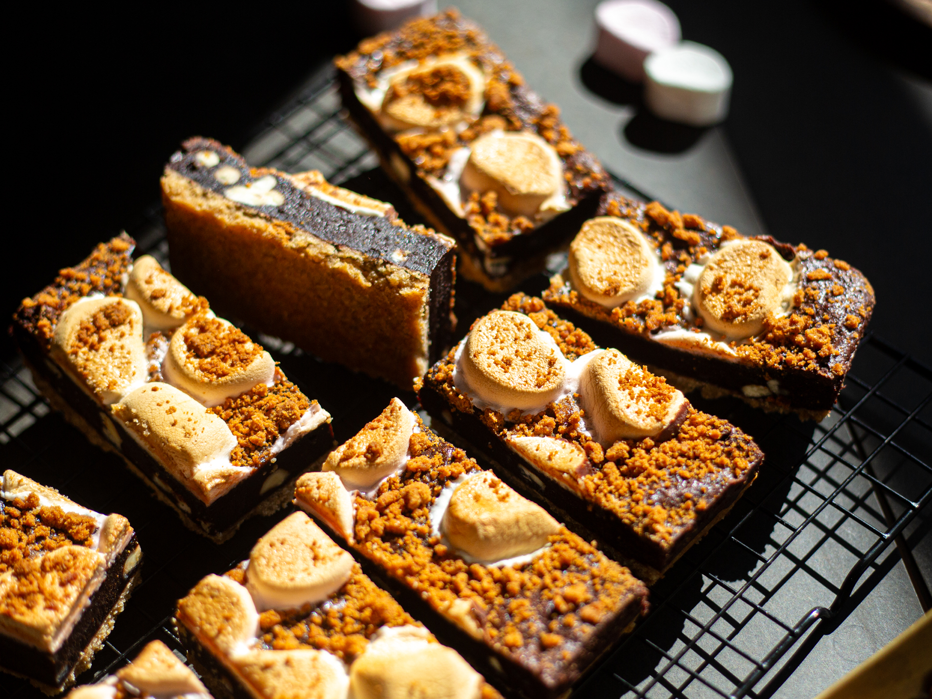S'mores Brownies with toasted  marshmallows and biscuit crumbs