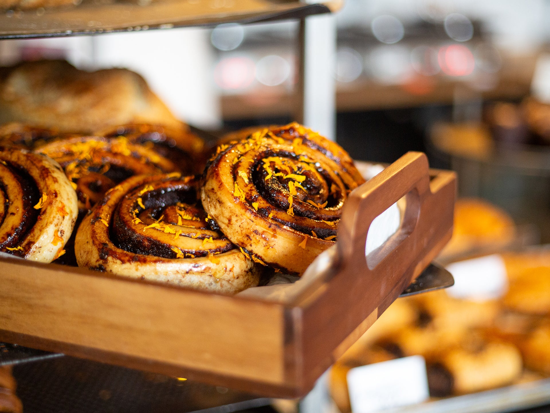 A tray of chocolate orange sticky buns - a great grab and go option for a cafe
