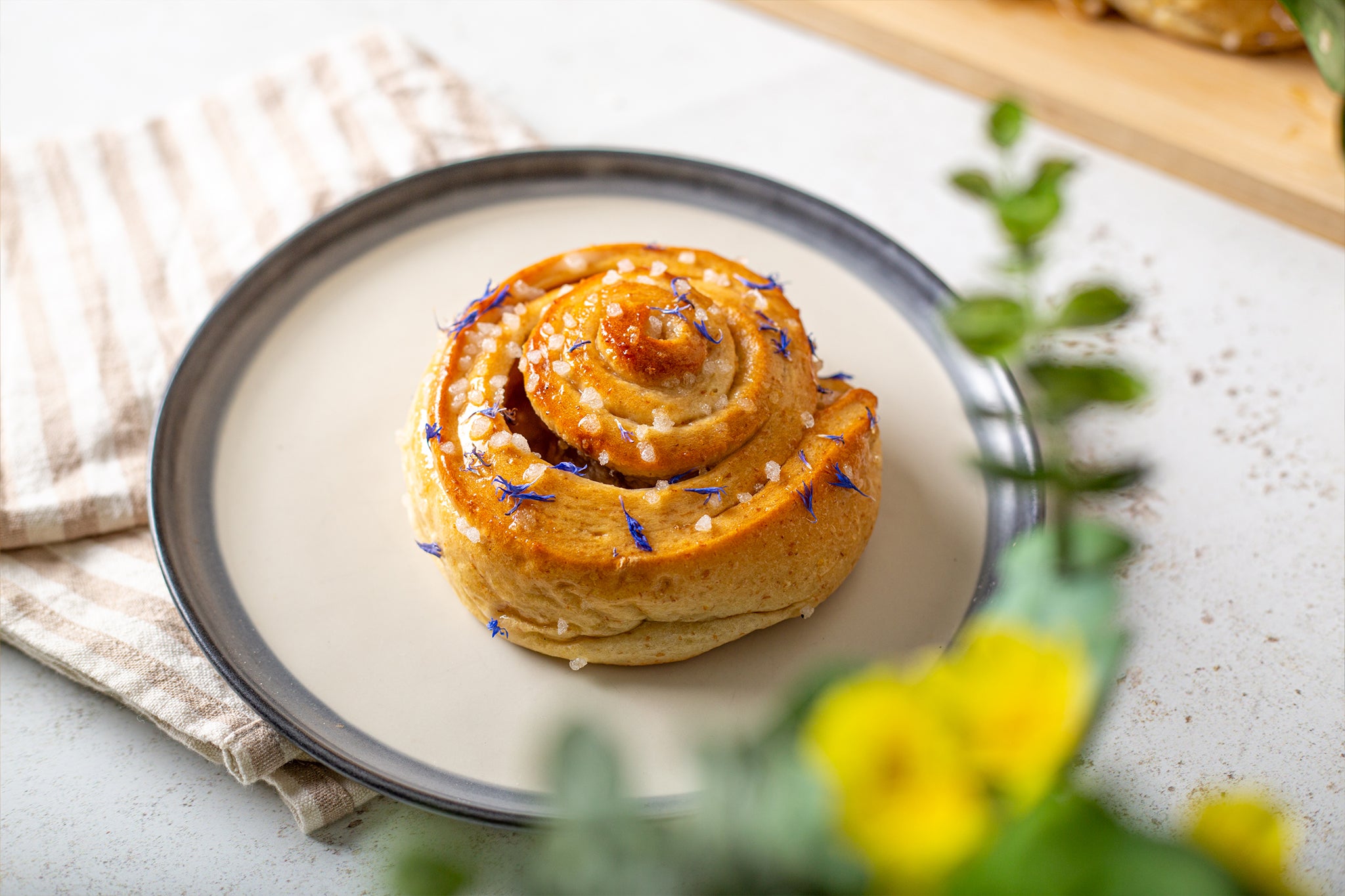 Serve up a Cakesmiths Lemon Drizzle bun in your coffee shop this summer