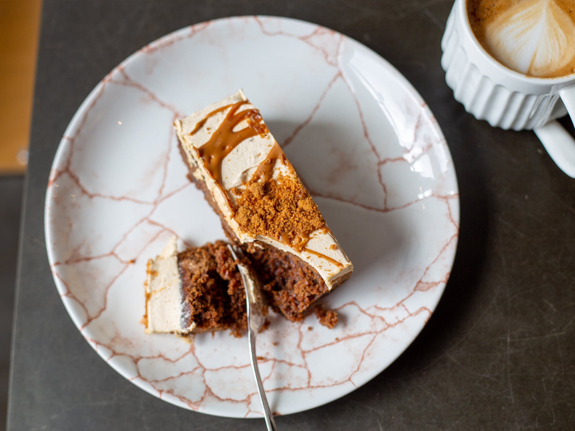 A slice of our sticky toffee biscoff traycake