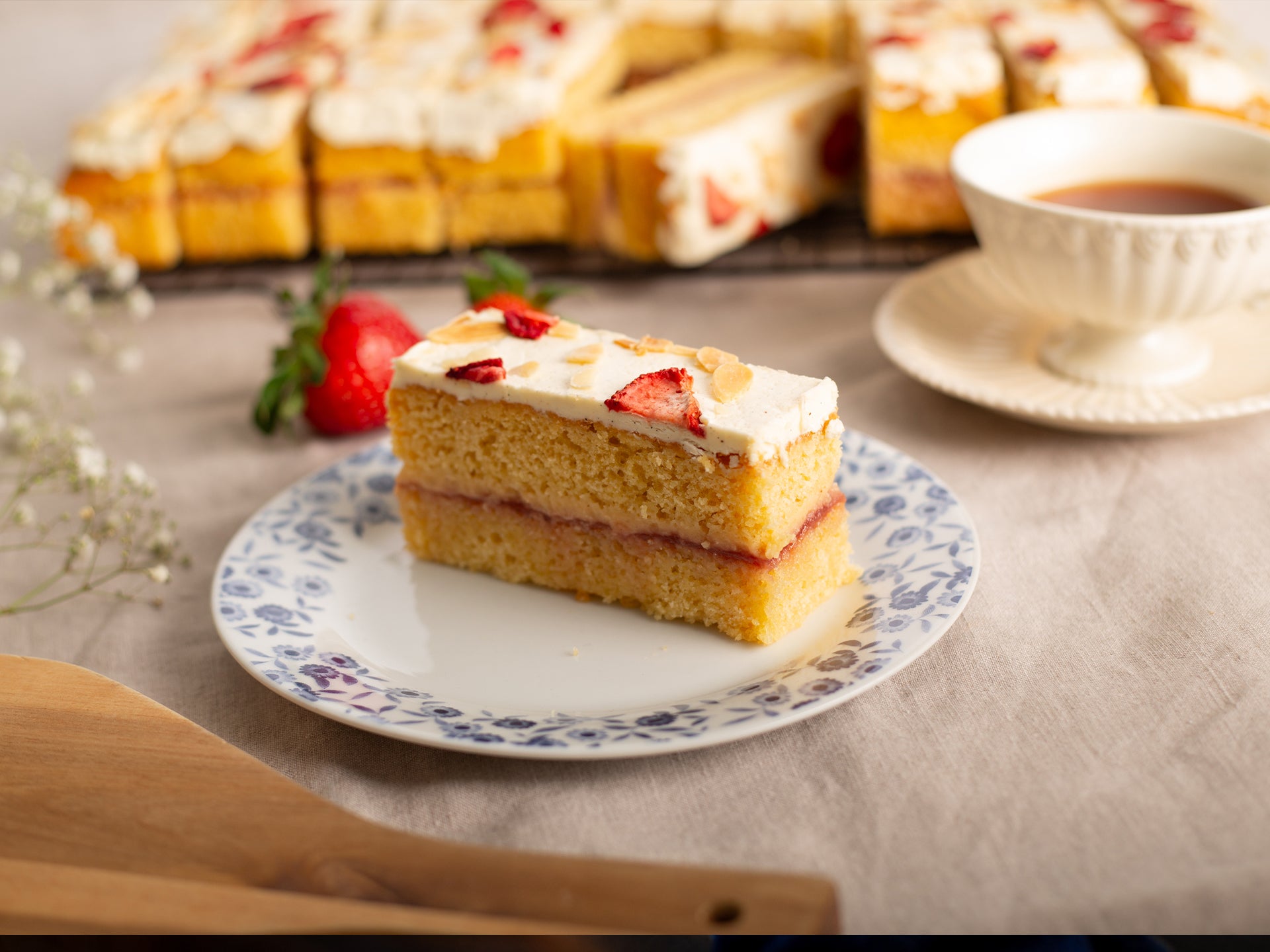 A slice of our wholesale Strawberry Trifle Cake, perfect served with a cup of tea