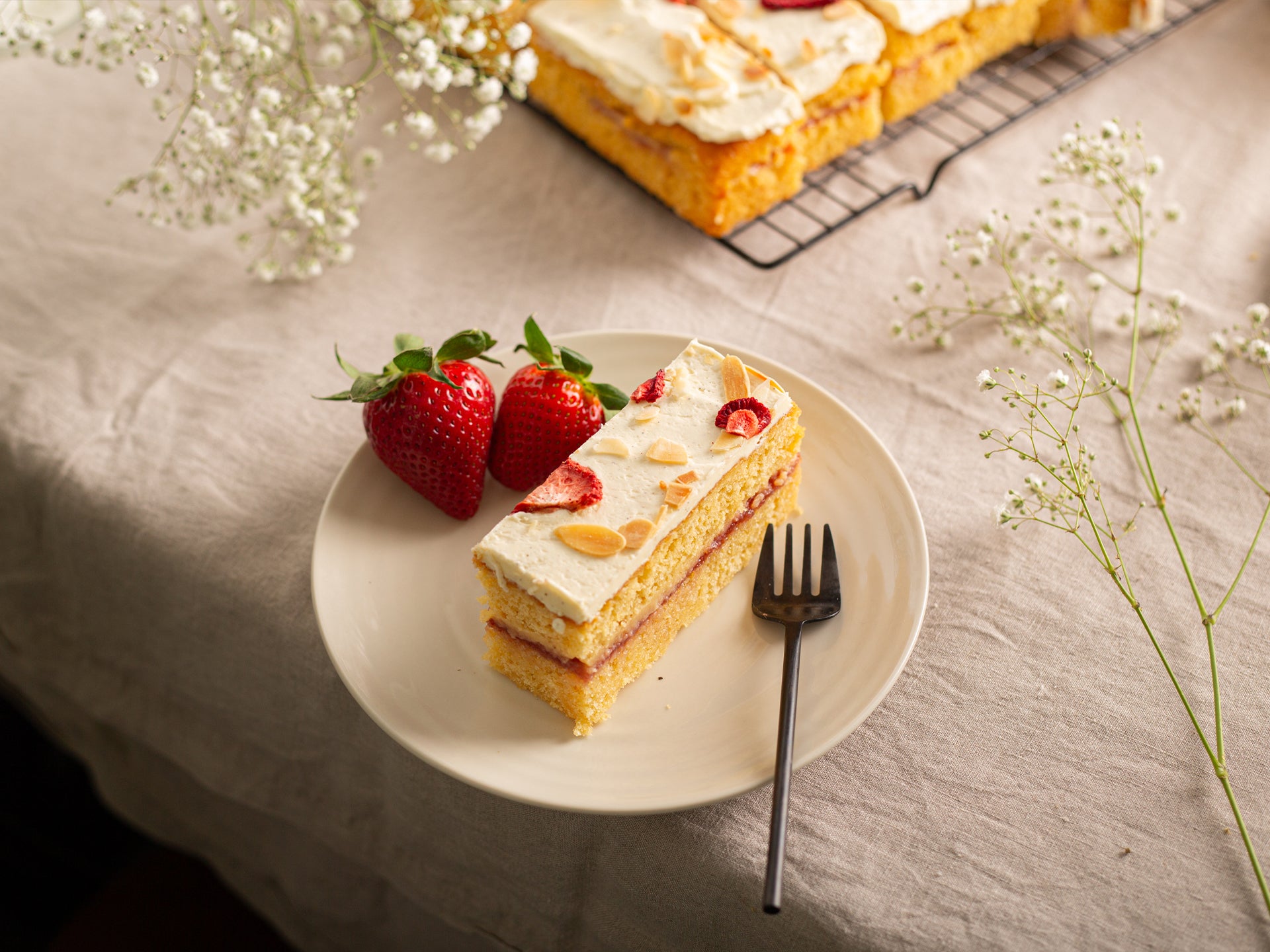 A slice of our beautiful wholesale Strawberry Trifle Cake 