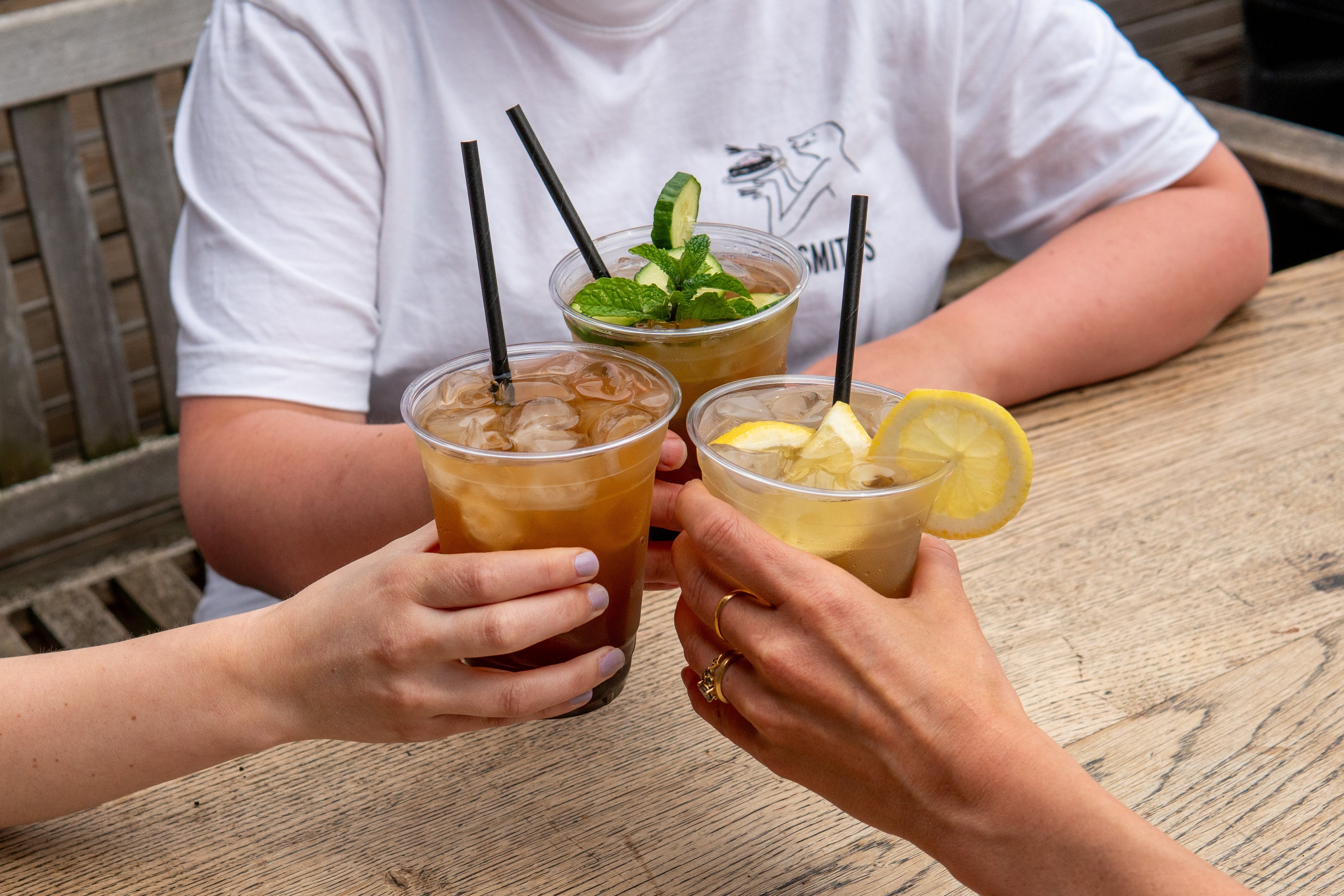 Iced Tea Cheers with Three People