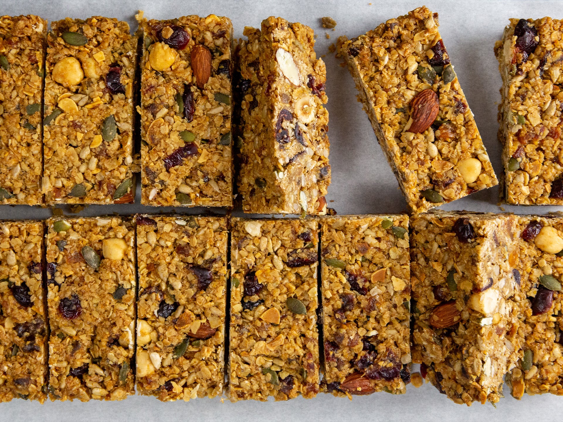 A tray of wholesale flapjack filled with fruit and nuts, available from Cakesmiths