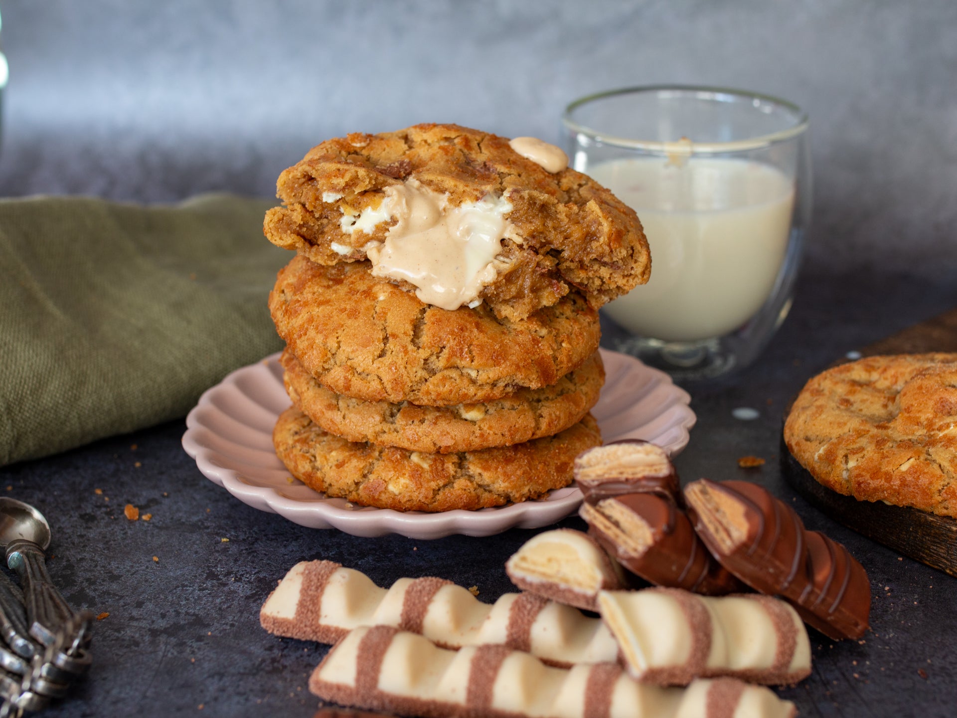 A stack of wholesale white chocolate cookies from Cakesmiths