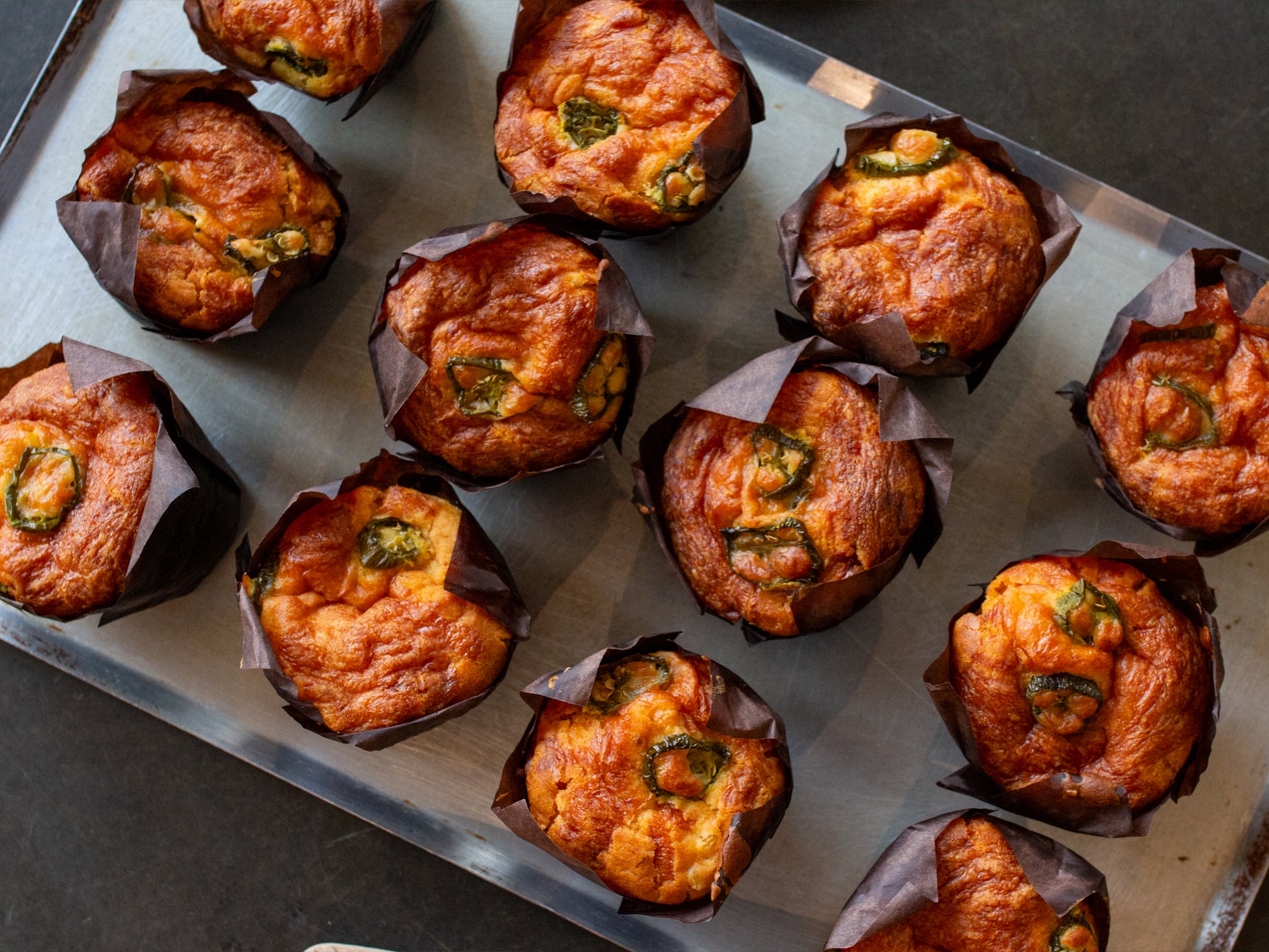 Wholesale muffins with cheese and jalapeño pieces